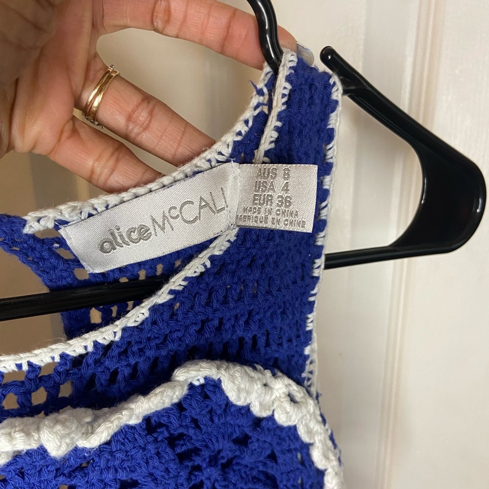 This is vibrant blue bathing suit cover up! Perfect for the beach